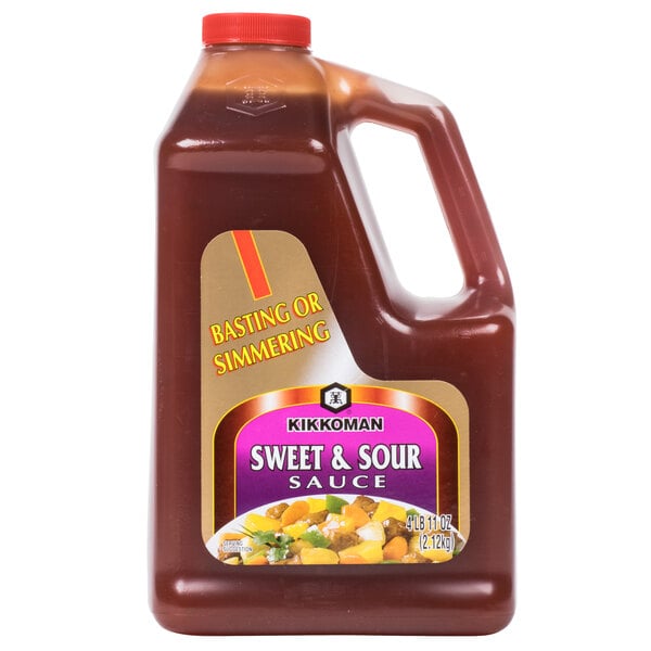 A Kikkoman plastic jug of sweet and sour sauce.