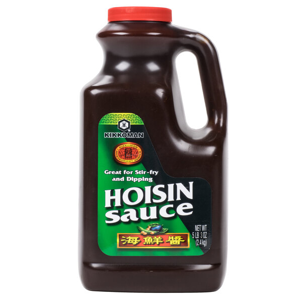 A brown plastic container of Kikkoman Hoisin Sauce with a label.