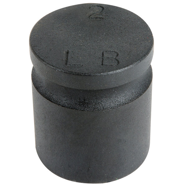 A black metal cylinder with the number 2 on it.