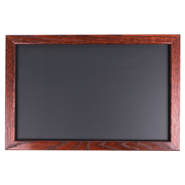 A mahogany framed black chalkboard.