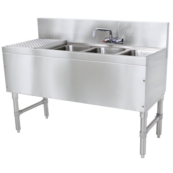 A stainless steel Advance Tabco underbar sink with 3 bowls, a drainboard, and a splash mount faucet.