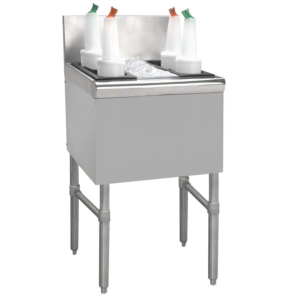 A stainless steel Advance Tabco underbar ice bin with containers and a pitcher inside.