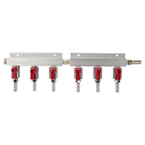 An aluminum Micro Matic 6-way beer gas distributor with red and silver valves on metal pipes.