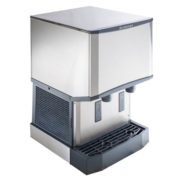 A Scotsman Meridian countertop ice machine and water dispenser with a silver surface.