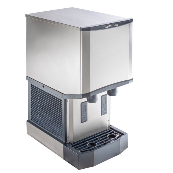 A Scotsman countertop ice machine and water dispenser with a stainless steel finish and silver and grey base.