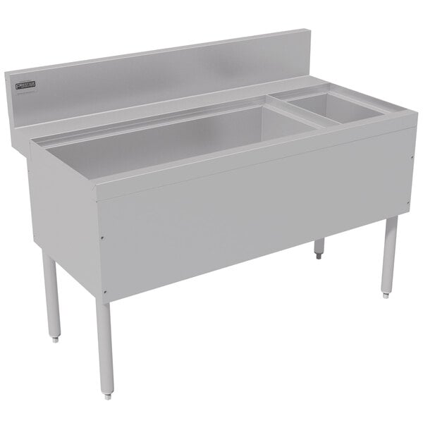 A stainless steel Advance Tabco ice bin and bottle storage combo unit with a divider in a school kitchen.