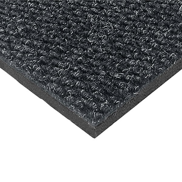 A close-up of a black Cactus Mat Berber carpet.