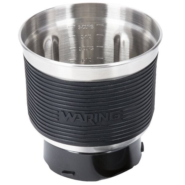 A stainless steel grinding bowl with a lid.