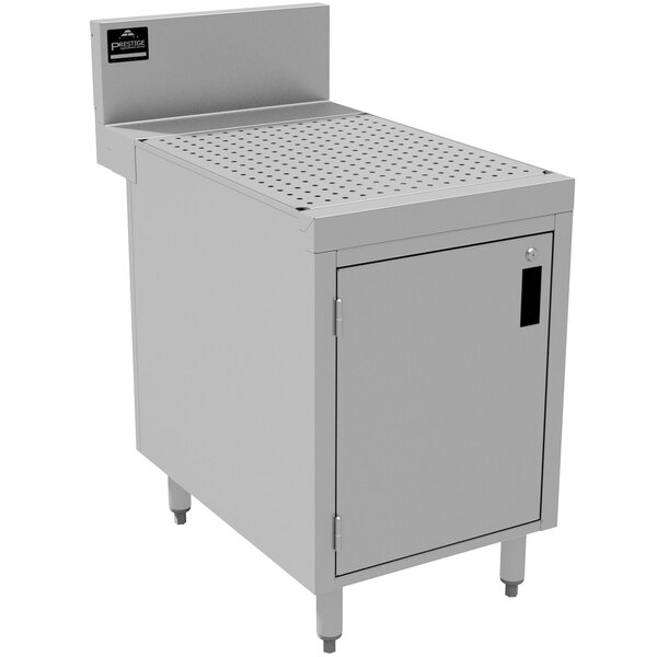 An Advance Tabco stainless steel cabinet with doors and a drainboard on top.