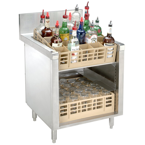 An Advance Tabco stainless steel glass rack storage cabinet on a counter with shelves holding bottles and glasses.