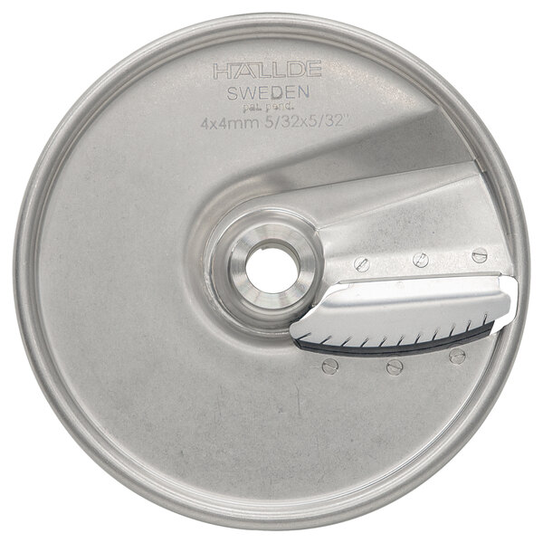 A circular stainless steel blade with a julienne knife on top.