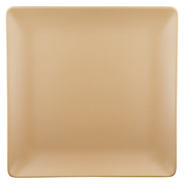 A tan square plate with a white border.