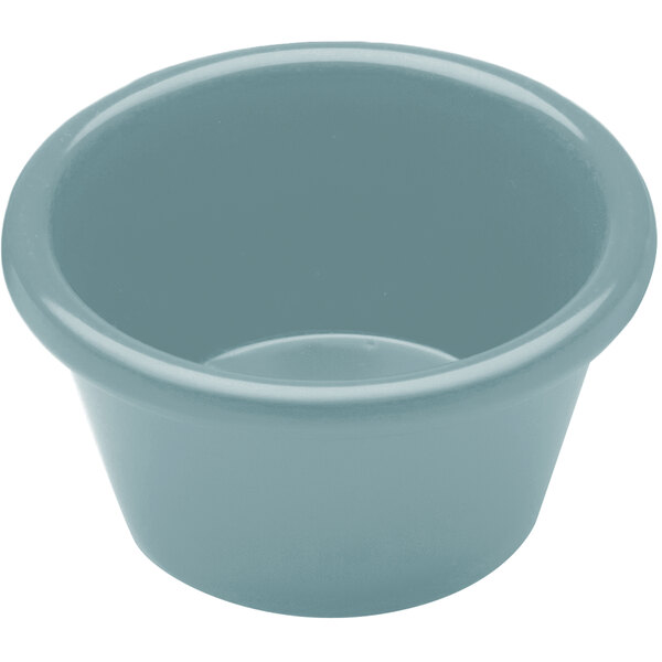 A close-up of a blue Elite Global Solutions melamine ramekin with a white background.