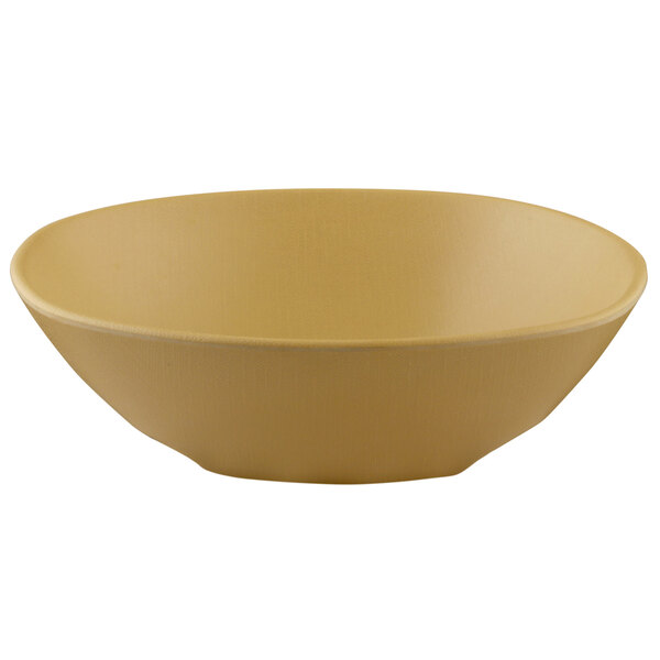 An irregular-shaped melamine bowl with a rattan color.