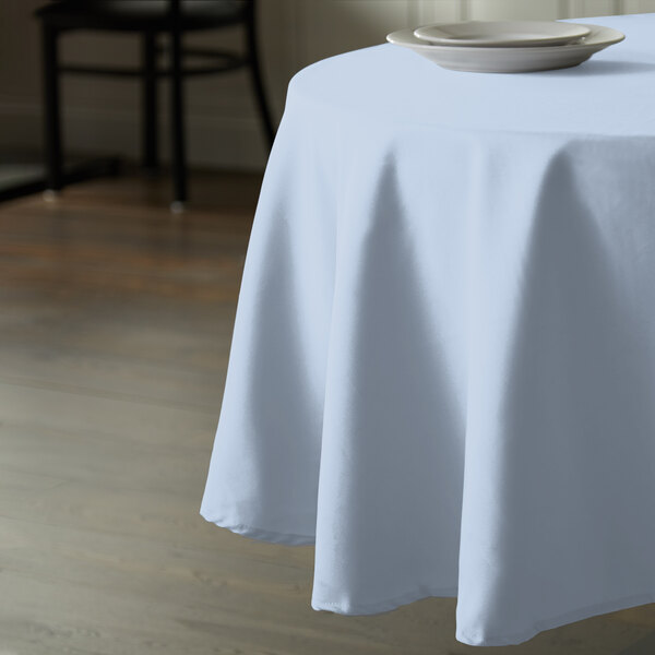 Intedge 120" Round Light Blue 100% Polyester Hemmed Cloth Table Cover