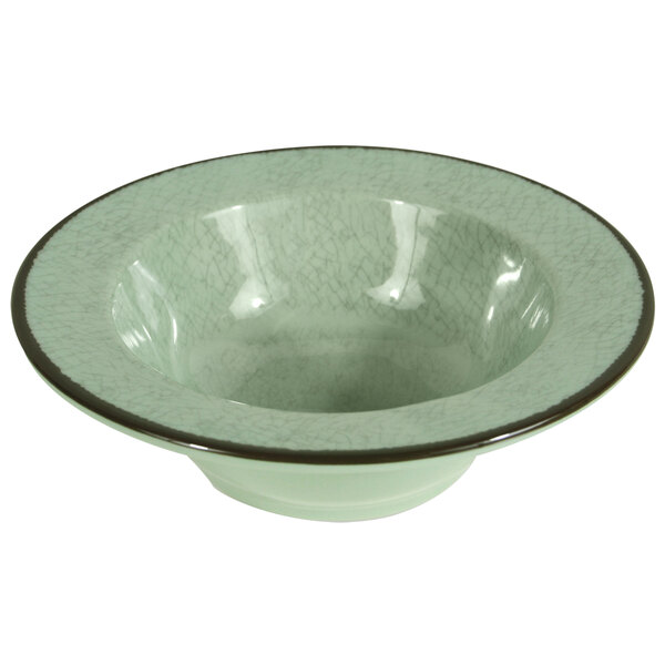 A green Elite Global Solutions Mojave melamine bowl with a brown rim.