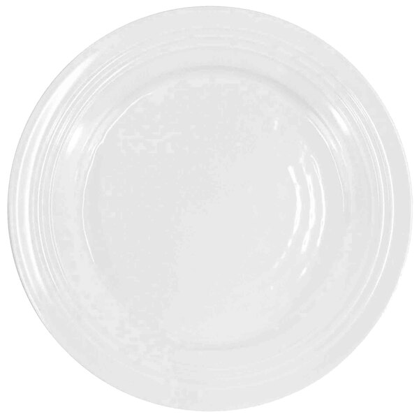 A close-up of a white Elite Global Solutions Durango melamine plate with a circular pattern on the edge.