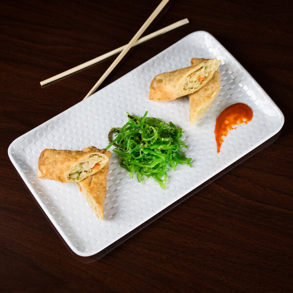 A white GET Coralline rectangular melamine platter with food and chopsticks.