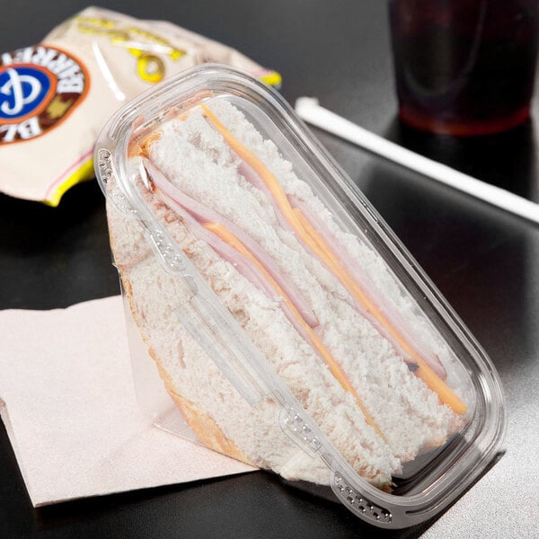 A sandwich in a Tamper Evident Recycled PET plastic container.