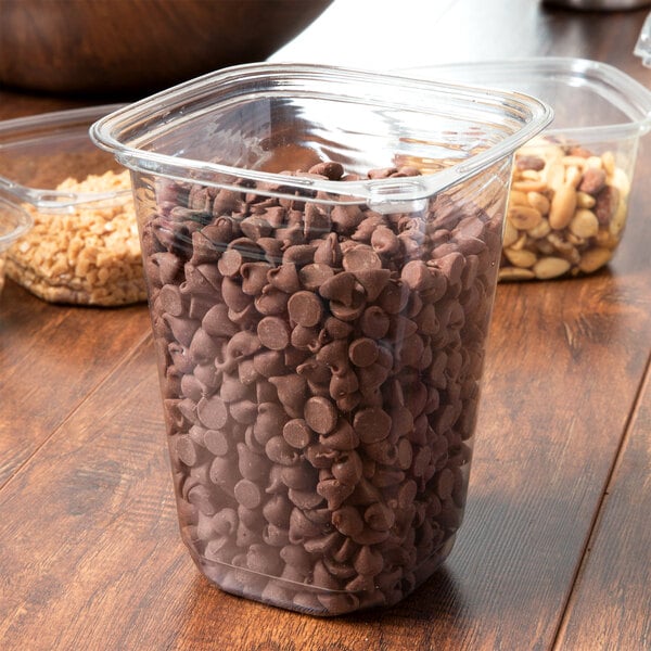A 32 oz. plastic container of chocolate chips.