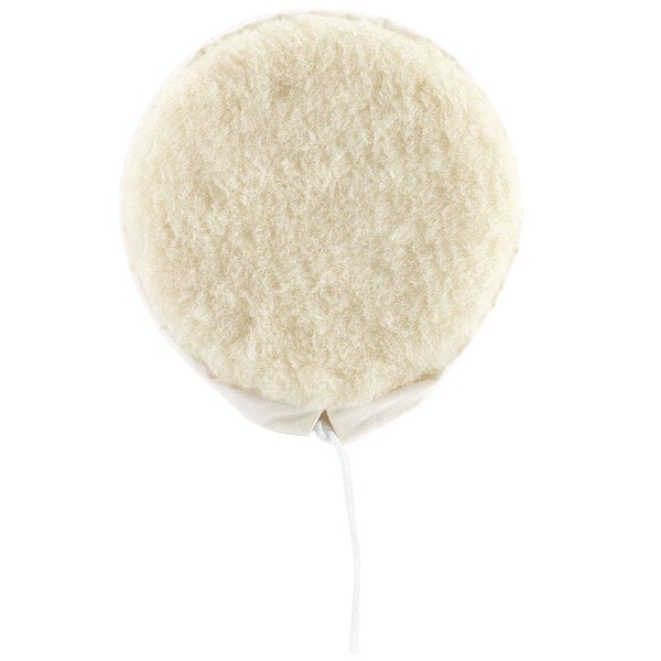 A round white Oreck wool bonnet with a cord.