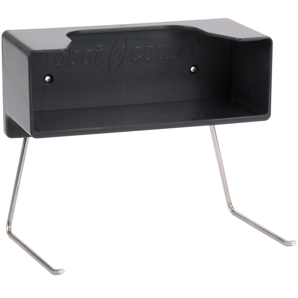 A black metal wall rack with a black handle holding black plastic boxes with discs and blades.