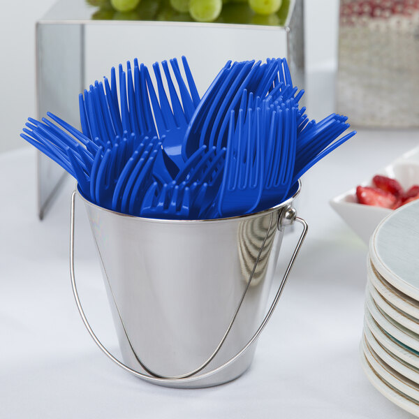 A bucket filled with blue Creative Converting plastic forks.