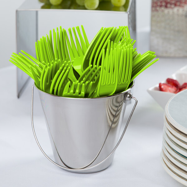 A bucket filled with green Creative Converting plastic forks.