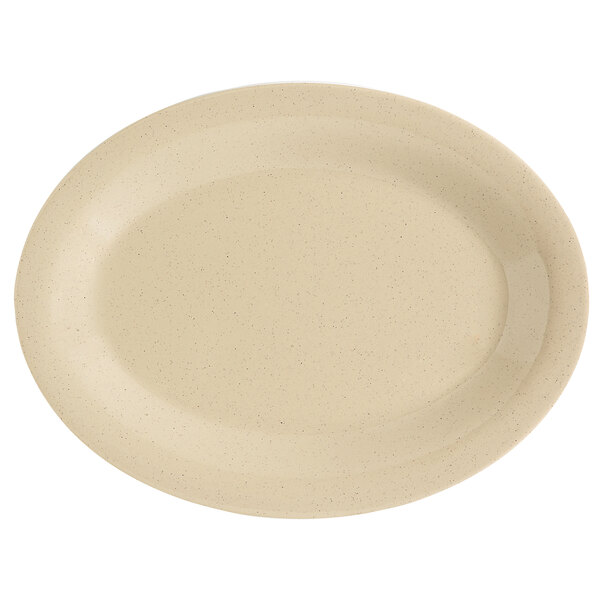 A white oval platter with a speckled sandstone surface.