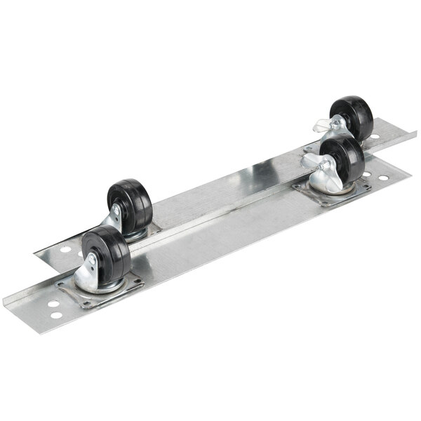 A metal plate with 4 black wheels attached.