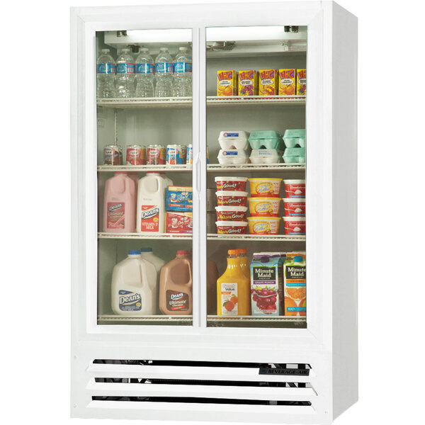 A white Beverage-Air LumaVue glass door refrigerator filled with dairy products and drinks.