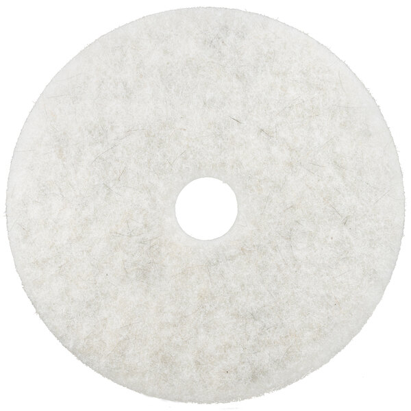 A white circular 3M Natural Blend burnishing floor pad with a hole in the center.