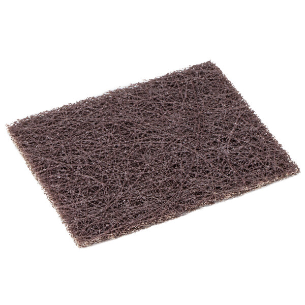 A brown woven mat on a white background.