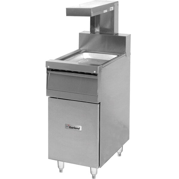 A Garland GF Series range match holding station with a heat lamp above a large commercial deep fryer.