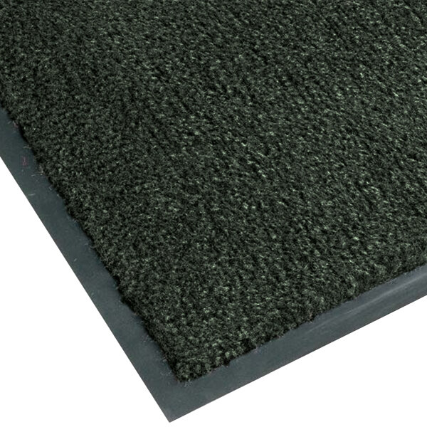 A forest green carpet entrance mat with a grey border.