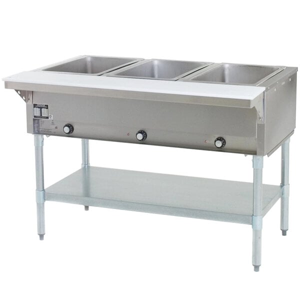 An Eagle Group stainless steel liquid propane steam table warmer with three pans.
