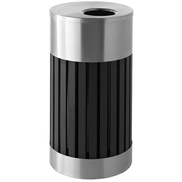 A close-up of a black and silver Commercial Zone ArchTec Riverview trash receptacle.