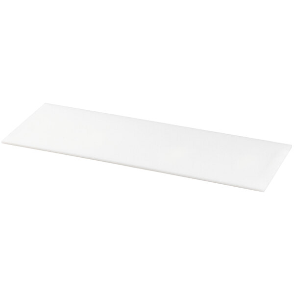 A white rectangular cutting board with a white border.