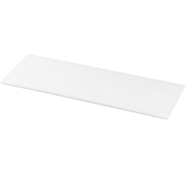 A white rectangular Turbo Air cutting board.