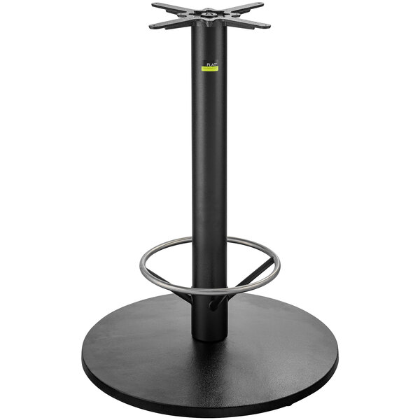 A FLAT Tech black metal bar height table base with foot ring.