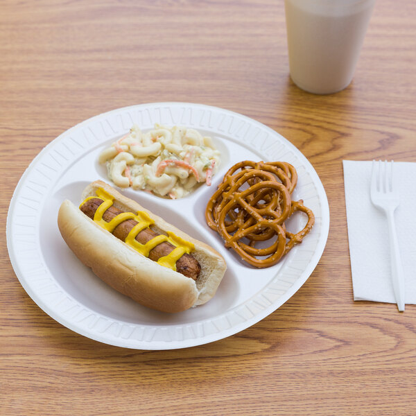 A Dart white foam plate with a hot dog, pretzels, and a drink on it.
