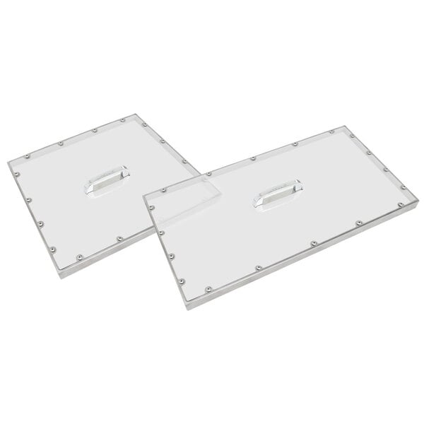 A pair of clear plastic pan covers with handles.