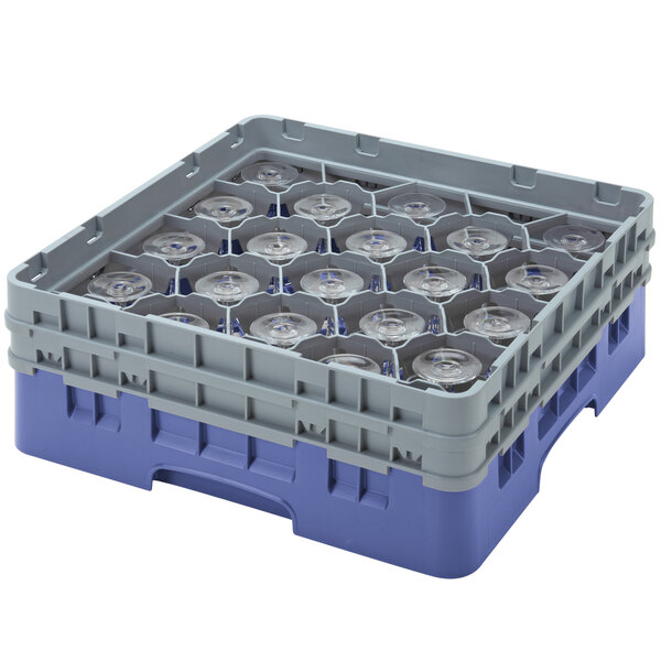 A blue plastic container with clear glasses inside and grey extenders.