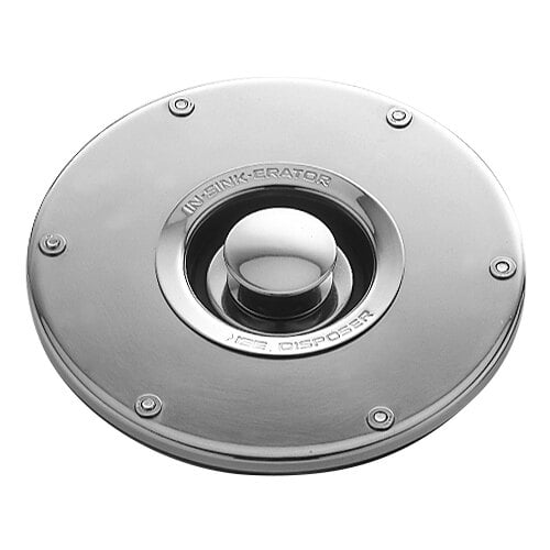 A silver circular InSinkErator sink flange with a hole in the center.