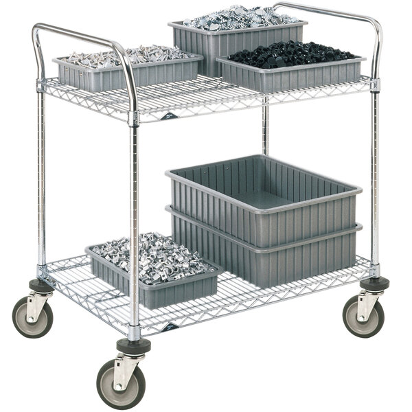 A Metro stainless steel utility cart with metal shelves holding black plastic pipes.