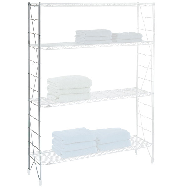 A white Metro Erecta wire shelving unit with white towels and sheets on the shelves.