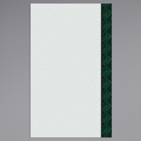 A white paper with a green woven border.