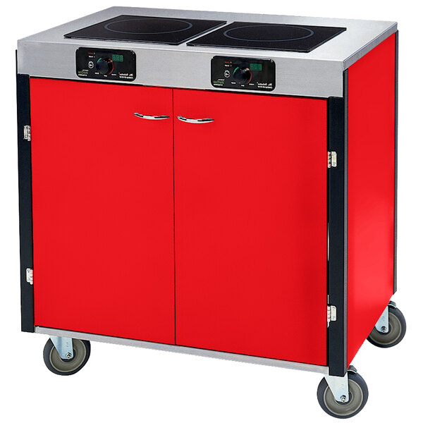 A red and silver Lakeside mobile cooking cart with two induction burners.