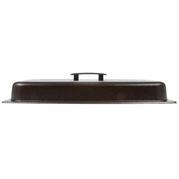 A brown metal rectangular lid with a handle.