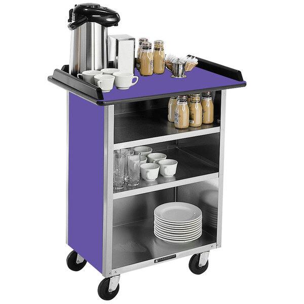 A Lakeside stainless steel beverage service cart with purple laminate shelves holding cups and dishes.